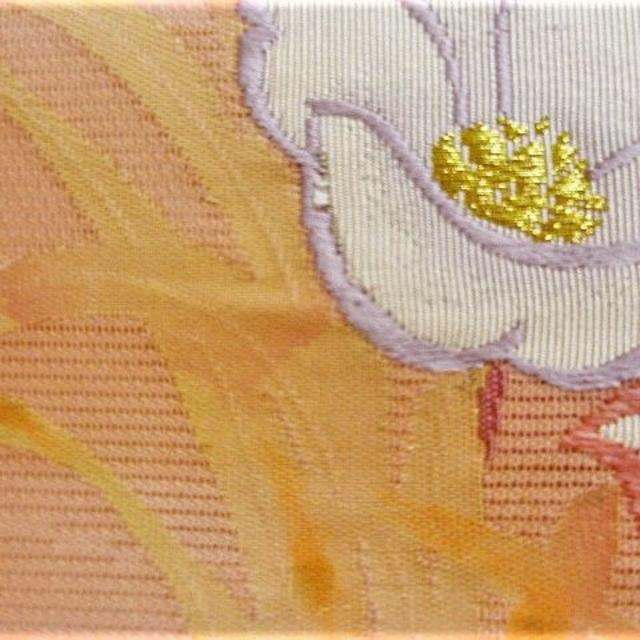 18 夏帯　正絹　絽　未使用　オレンジピンク地　花柄 レディースの水着/浴衣(帯)の商品写真