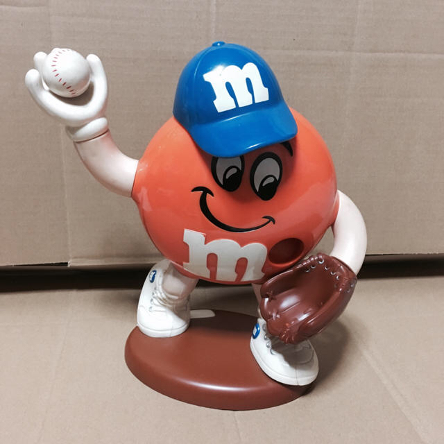 m&m&m's(エムアンドエムアンドエムズ)のm&m ディスペンサー おもちゃ橙 ベースボール エンタメ/ホビーのおもちゃ/ぬいぐるみ(キャラクターグッズ)の商品写真