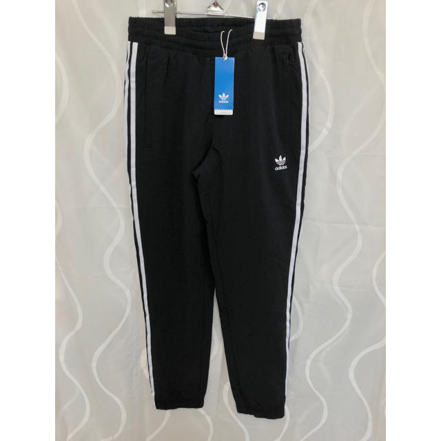 adidas(アディダス)のadidas originals  WARM UP TRACK PANTS レディースのパンツ(カジュアルパンツ)の商品写真