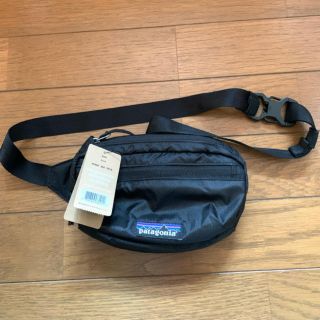 パタゴニア(patagonia)のパタゴニア ライトウェイト トラベルミニヒップパック　新品未使用！(ウエストポーチ)