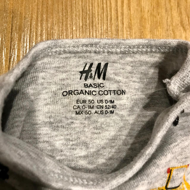 H&M(エイチアンドエム)のIzu107978様専用　ショベルカー　長袖ロンパース   キッズ/ベビー/マタニティのベビー服(~85cm)(ロンパース)の商品写真