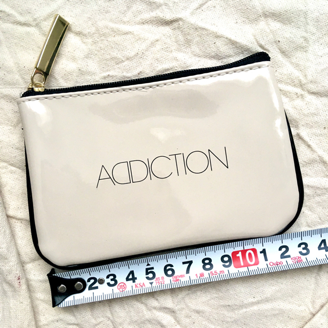 ADDICTION(アディクション)の非売品　ADDICTION ミニポーチ レディースのファッション小物(ポーチ)の商品写真