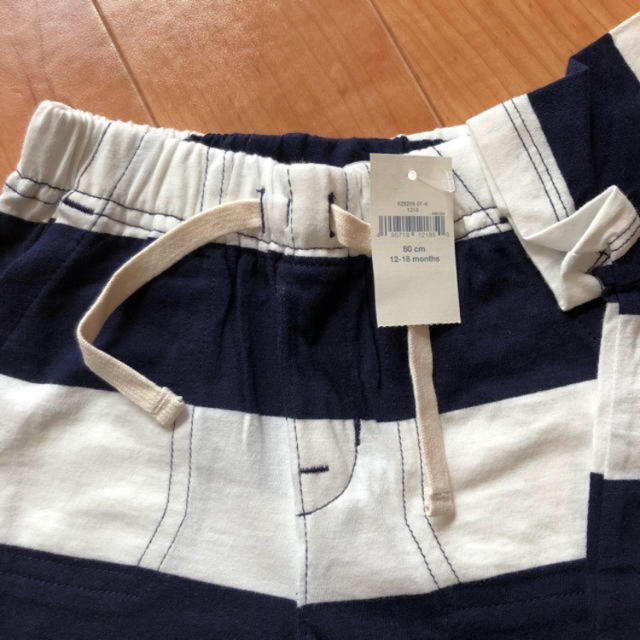 babyGAP(ベビーギャップ)のGAP 新品　ボーダーセットアップ キッズ/ベビー/マタニティのベビー服(~85cm)(ロンパース)の商品写真