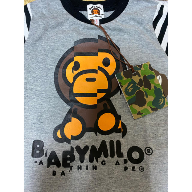 A BATHING APE(アベイシングエイプ)の値下げ☆【新品未使用】BABY MILO キッズTシャツ　100サイズ キッズ/ベビー/マタニティのキッズ服男の子用(90cm~)(Tシャツ/カットソー)の商品写真