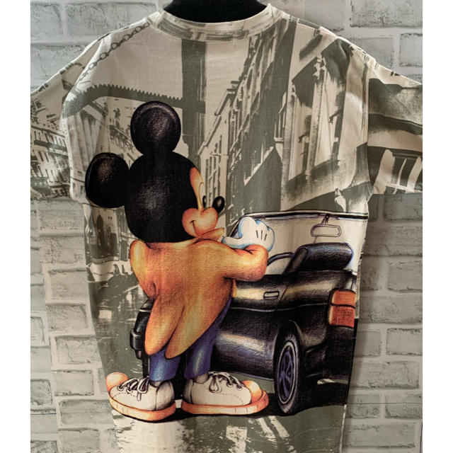 Disney(ディズニー)のヴィンテージ　Disney ミッキー　全面プリント　Tシャツ　コピーライト有り メンズのトップス(Tシャツ/カットソー(半袖/袖なし))の商品写真