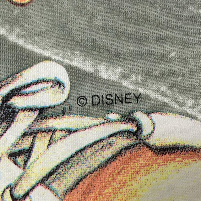 Disney(ディズニー)のヴィンテージ　Disney ミッキー　全面プリント　Tシャツ　コピーライト有り メンズのトップス(Tシャツ/カットソー(半袖/袖なし))の商品写真