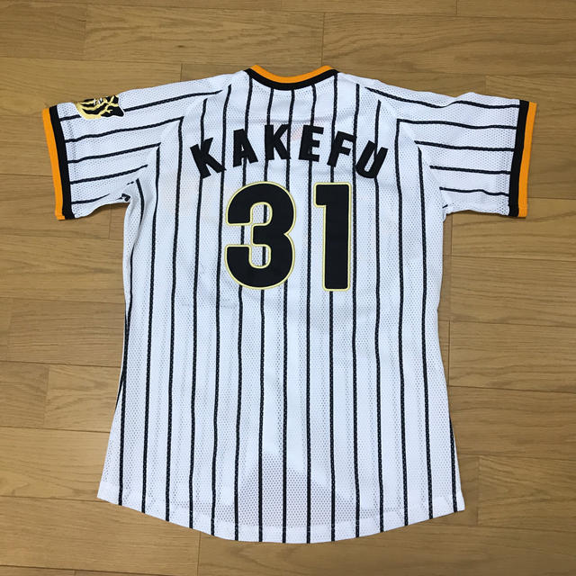 阪神タイガース(ハンシンタイガース)の阪神タイガース　ユニホーム スポーツ/アウトドアの野球(応援グッズ)の商品写真