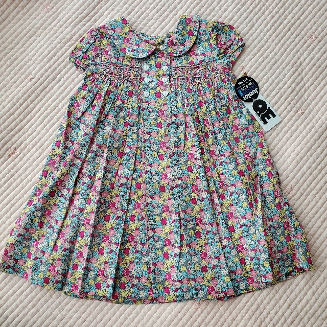 Bonpoint(ボンポワン)のQuestion Everything　スモッキングワンピース　花 キッズ/ベビー/マタニティのキッズ服女の子用(90cm~)(ワンピース)の商品写真