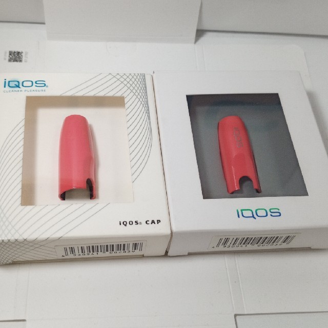 IQOS(アイコス)のIQOS キャップ　サンセットオレンジ　２個　新品未使用未開封 メンズのファッション小物(タバコグッズ)の商品写真