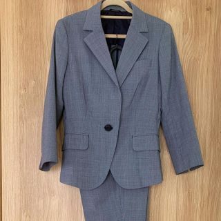 スーツカンパニー(THE SUIT COMPANY)の夏用七分袖パンツスーツ（ネイビー）(スーツ)