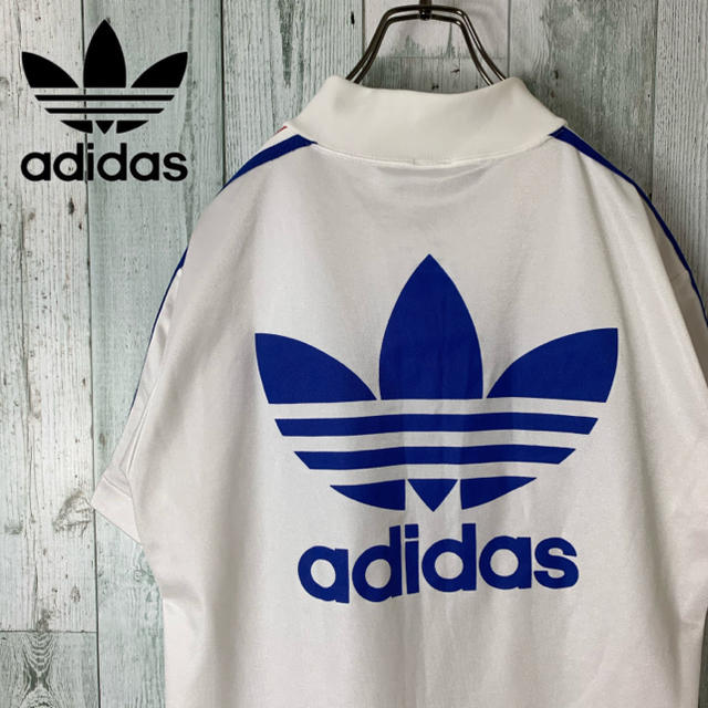 adidas(アディダス)の【バックプリント 】アディダス デカロゴ トレフォイル ポロシャツ 白 メンズのトップス(Tシャツ/カットソー(半袖/袖なし))の商品写真