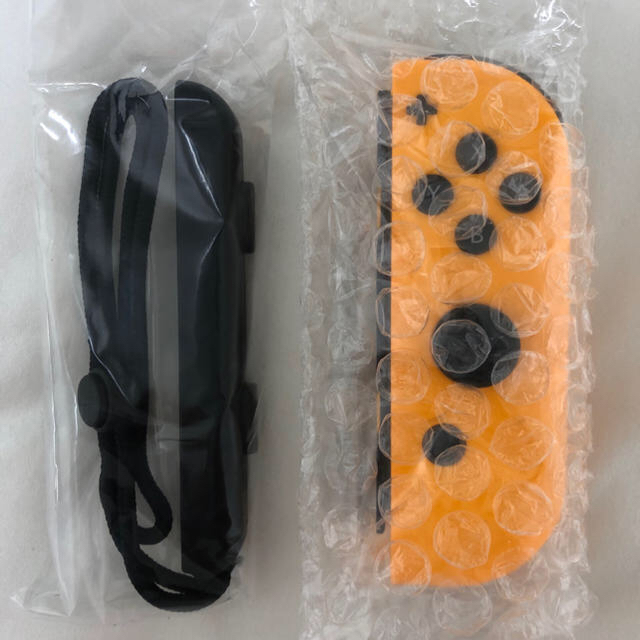 Nintendo Switch(ニンテンドースイッチ)のジョイコン オレンジ グリーン　セット エンタメ/ホビーのゲームソフト/ゲーム機本体(家庭用ゲーム機本体)の商品写真