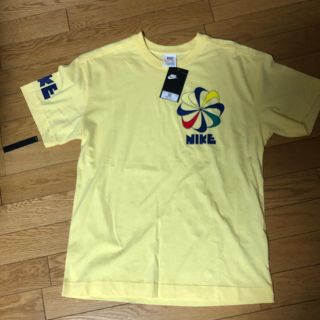 ナイキ(NIKE)のNIKE  風車　ロゴTシャツ　イエロー　S(Tシャツ/カットソー(半袖/袖なし))