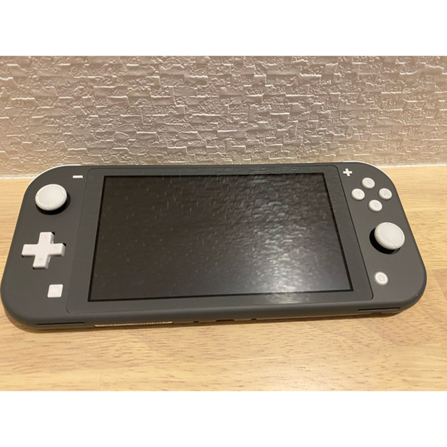 Nintendo Switch(ニンテンドースイッチ)のNintendo SwitchLite グレー　あつまれどうぶつの森 エンタメ/ホビーの雑誌(ゲーム)の商品写真