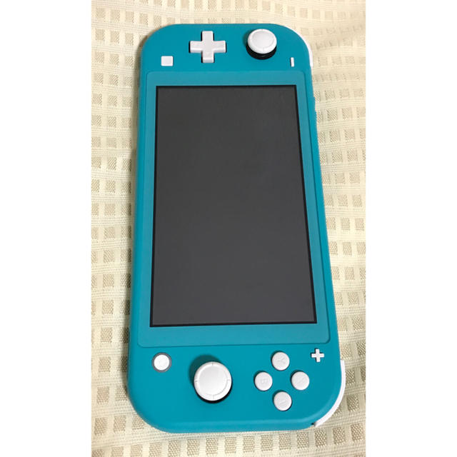 Nintendo Switch(ニンテンドースイッチ)のNintendo Switch  LITE ターコイズ スイッチライトカバー付 エンタメ/ホビーのゲームソフト/ゲーム機本体(携帯用ゲーム機本体)の商品写真