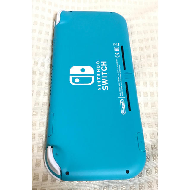 Nintendo Switch(ニンテンドースイッチ)のNintendo Switch  LITE ターコイズ スイッチライトカバー付 エンタメ/ホビーのゲームソフト/ゲーム機本体(携帯用ゲーム機本体)の商品写真