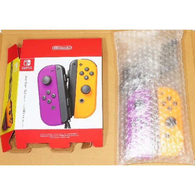 Nintendo Switch(ニンテンドースイッチ)のJOY-CON (L)/(R) ネオンパープル/ネオンオレンジ ジョイコン エンタメ/ホビーのゲームソフト/ゲーム機本体(その他)の商品写真