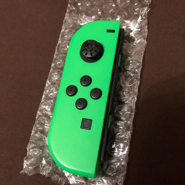 Nintendo Switch(ニンテンドースイッチ)のSwitch 左　ジョイコン　緑　ジャンク品 エンタメ/ホビーのゲームソフト/ゲーム機本体(携帯用ゲーム機本体)の商品写真