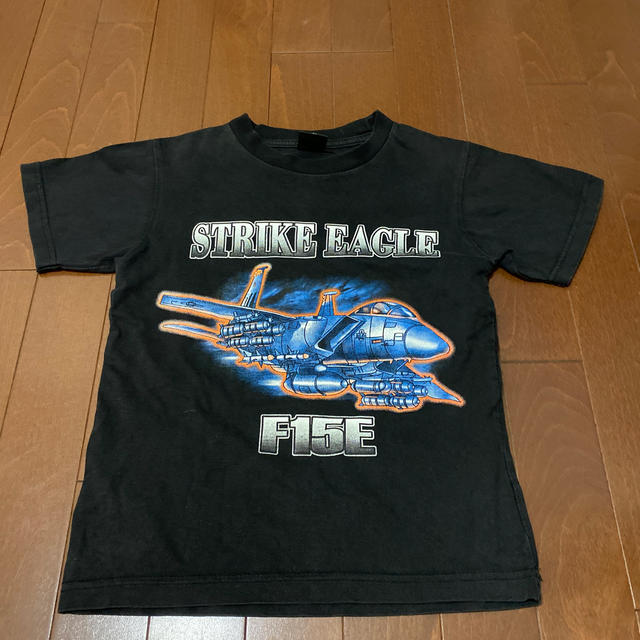 戦闘機　F15E Tシャツ 140センチ 小松基地で購入 キッズ/ベビー/マタニティのキッズ服男の子用(90cm~)(Tシャツ/カットソー)の商品写真