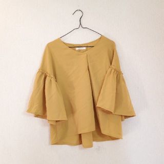 ショコラフィネローブ(chocol raffine robe)のchocol raffine*袖フリルトップス(カットソー(半袖/袖なし))