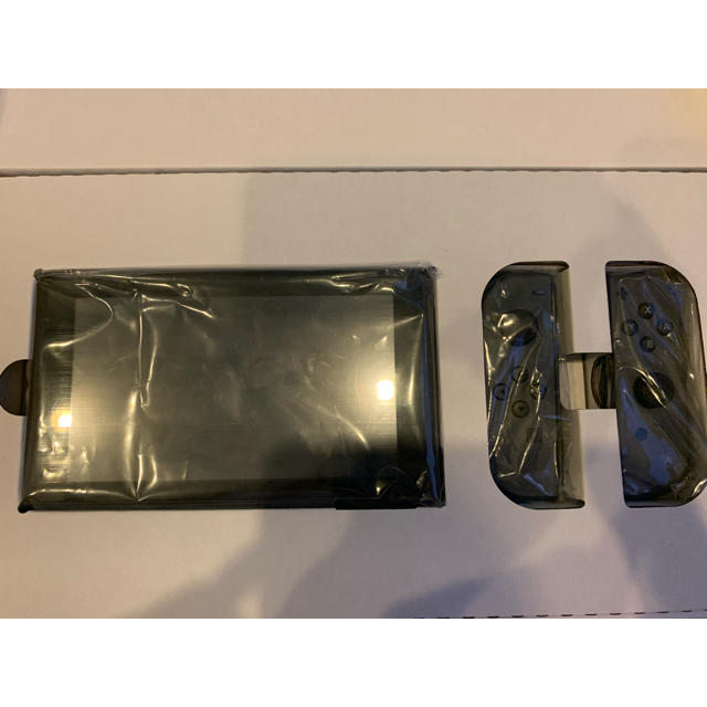 Nintendo Switch(ニンテンドースイッチ)の【美中古】ニンテンドースイッチ　グレー　どうぶつの森ソフト　ケース付き　 エンタメ/ホビーのゲームソフト/ゲーム機本体(家庭用ゲーム機本体)の商品写真