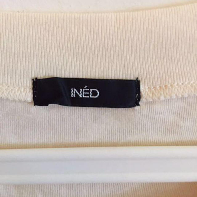 INED(イネド)のINED イネド 丸首Tシャツ サイズ 9 レディースのトップス(シャツ/ブラウス(半袖/袖なし))の商品写真
