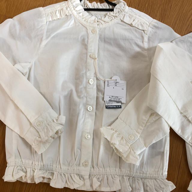 F.O.Factory(エフオーファクトリー)のaprès les cours オフホワイト　フリルシャツ　 キッズ/ベビー/マタニティのキッズ服女の子用(90cm~)(Tシャツ/カットソー)の商品写真