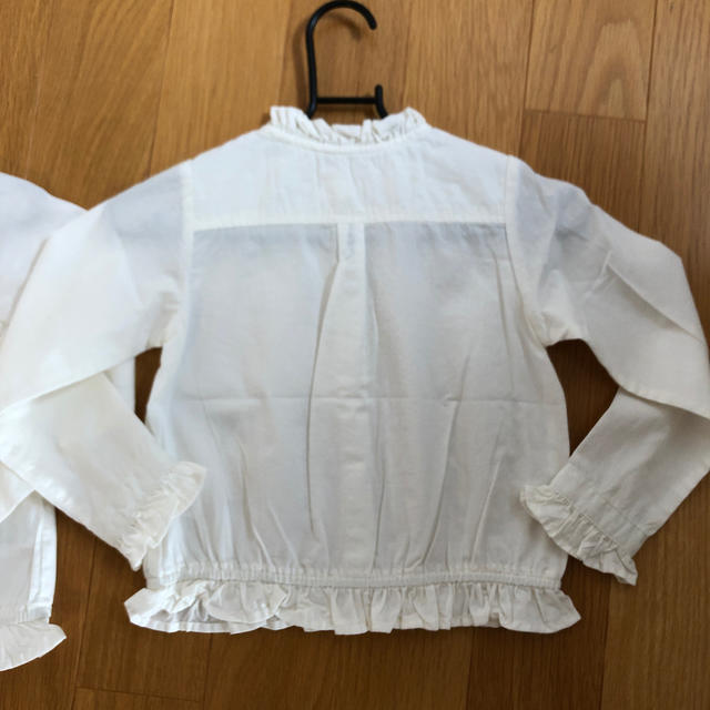 F.O.Factory(エフオーファクトリー)のaprès les cours オフホワイト　フリルシャツ　 キッズ/ベビー/マタニティのキッズ服女の子用(90cm~)(Tシャツ/カットソー)の商品写真