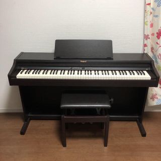 ローランド(Roland)の　ローランド　ピアノ　RP301  2012年購入　イス、説明書付き(電子ピアノ)