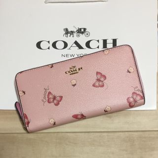 【新品】COACH 長財布 蝶々柄！ファッション小物