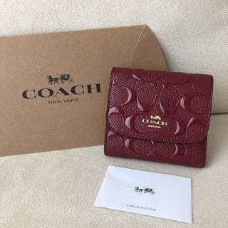 コーチ(COACH)の新品★COACH（コーチ）三つ折り財布 シグネチャー ワインレッド (財布)