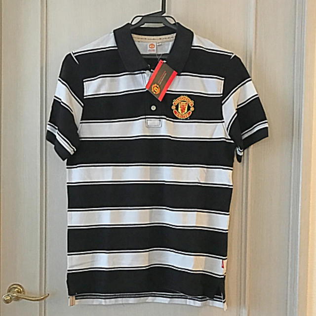 ウルトラソウル様　未使用タグ付き　MANCHESTER UNITED ポロシャツ メンズのトップス(ポロシャツ)の商品写真