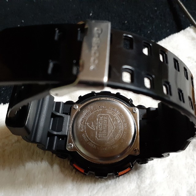 G-SHOCK(ジーショック)のGショック　ブラック×オレンジ メンズの時計(腕時計(デジタル))の商品写真