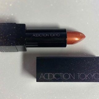 アディクション(ADDICTION)のADDICTION サテンL 010 red Flake Jasper(口紅)