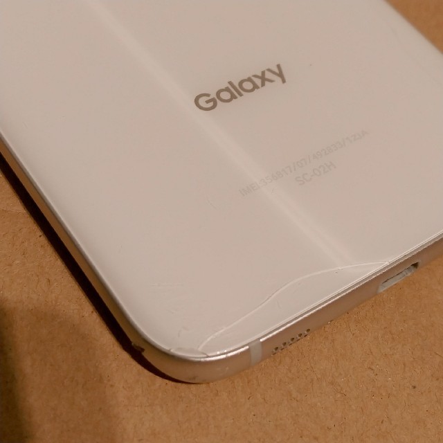 SAMSUNG(サムスン)のGalaxy S7 edge ホワイト 32 GB docomo ドコモ スマホ/家電/カメラのスマートフォン/携帯電話(スマートフォン本体)の商品写真