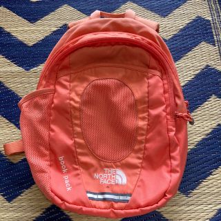 ザノースフェイス(THE NORTH FACE)のノースフェイス リュックサック滑り止めベルト付きオレンジ ロゴ(リュックサック)