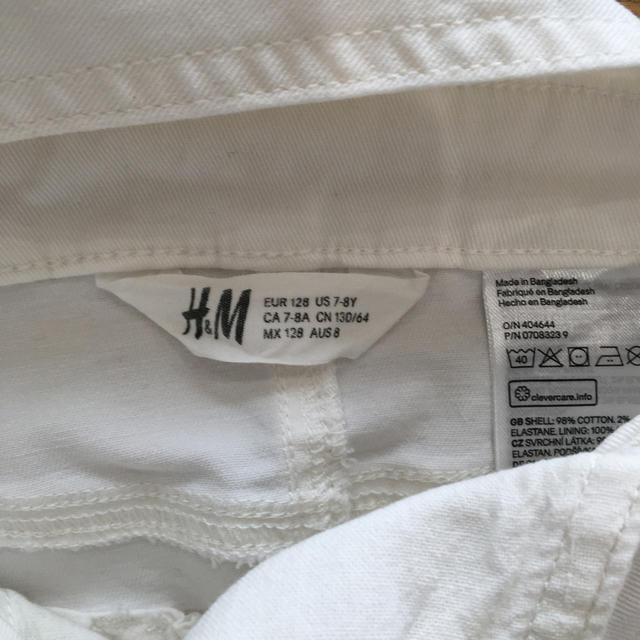 H&M(エイチアンドエム)のh&m ホワイトデニム　オーバーオール　スカート　128㎝ キッズ/ベビー/マタニティのキッズ服女の子用(90cm~)(ワンピース)の商品写真