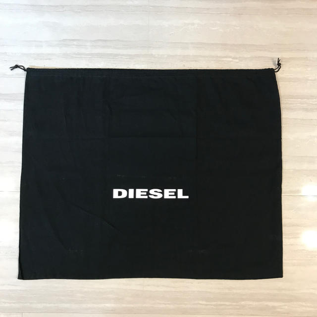 DIESEL(ディーゼル)のDIESELバックケース(黒) インテリア/住まい/日用品の日用品/生活雑貨/旅行(旅行用品)の商品写真