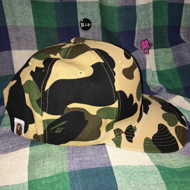 A BATHING APE(アベイシングエイプ)の1st camo イエロー キャップ supreme ブリーチ 靴下 メンズの帽子(キャップ)の商品写真
