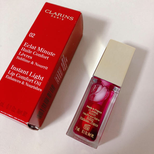 CLARINS(クラランス)の値下げ★新品未使用♡ コンフォートリップオイル 02 ラズベリー　クラランス コスメ/美容のベースメイク/化粧品(リップグロス)の商品写真