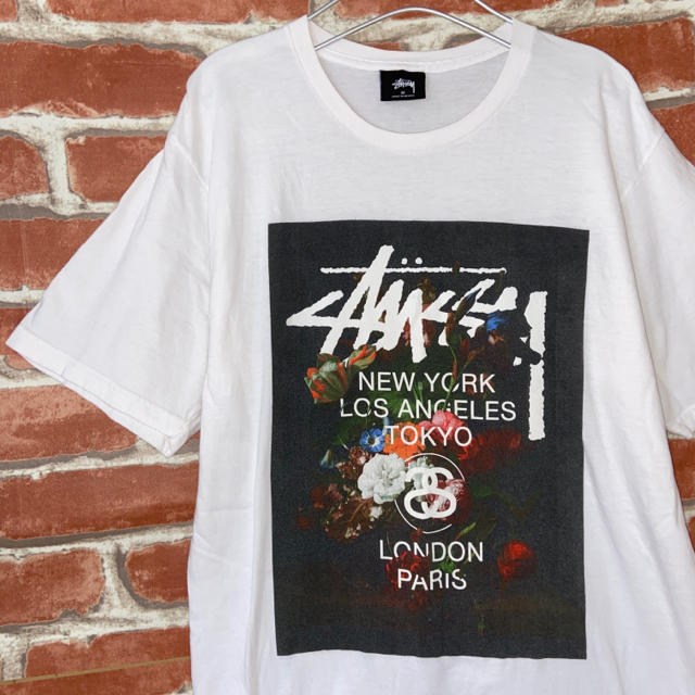 STUSSY(ステューシー)の【メキシコ製】stussy/ステューシー　ビックロゴ&花柄プリント入り　TEE メンズのトップス(Tシャツ/カットソー(半袖/袖なし))の商品写真