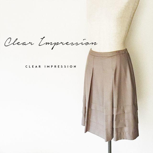 CLEAR IMPRESSION(クリアインプレッション)のCLEAR IMPRESSION☆夏物タックフレアスカート レディースのスカート(ひざ丈スカート)の商品写真