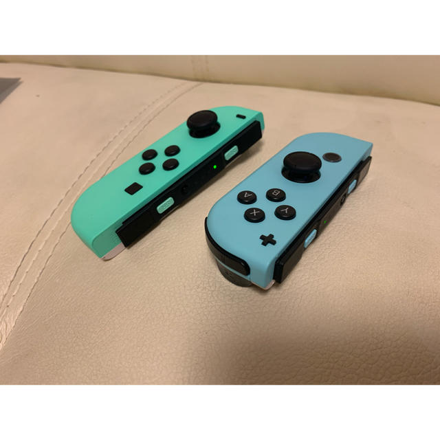 Nintendo Switch(ニンテンドースイッチ)のニンテンドーswitch本体裏面、ジョイコンのどうぶつの森着せ替えキット エンタメ/ホビーのゲームソフト/ゲーム機本体(家庭用ゲーム機本体)の商品写真