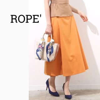 ロペ(ROPE’)のROPE ロペ ハリ生地ロングスカート オレンジ(ロングスカート)