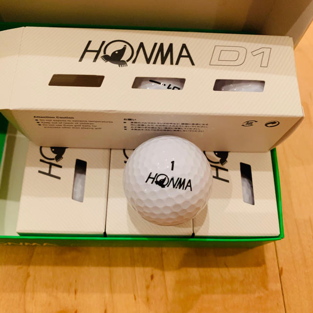 本間ゴルフ(ホンマゴルフ)の【新品】HONMA ゴルフボールD1 1ダース（12個） スポーツ/アウトドアのゴルフ(その他)の商品写真