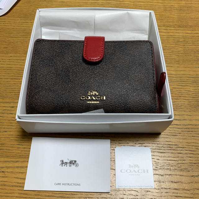 COACH二つ折り財布　F23553