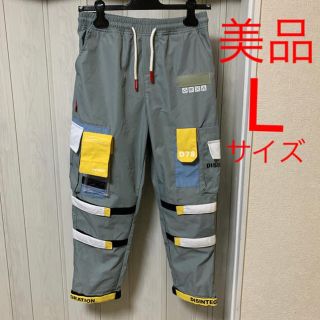 オフホワイト(OFF-WHITE)のDISINTEGRATION マルチポケッタブルテープ カーゴパンツ  L(ワークパンツ/カーゴパンツ)