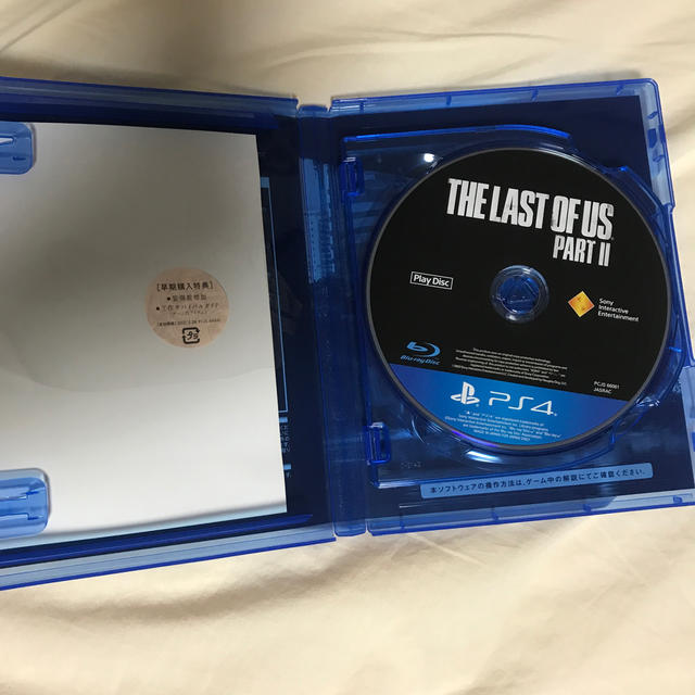 PlayStation4(プレイステーション4)の美品　早期特典付き　ラストオブアス2    THE LAST OF US 2 エンタメ/ホビーのゲームソフト/ゲーム機本体(家庭用ゲームソフト)の商品写真