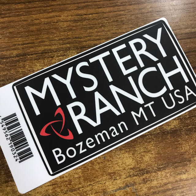 MYSTERY RANCH(ミステリーランチ)の★補強あり発送★新品未使用　ミステリーランチ　ヘリテージロゴステッカー　黒 スポーツ/アウトドアのアウトドア(その他)の商品写真