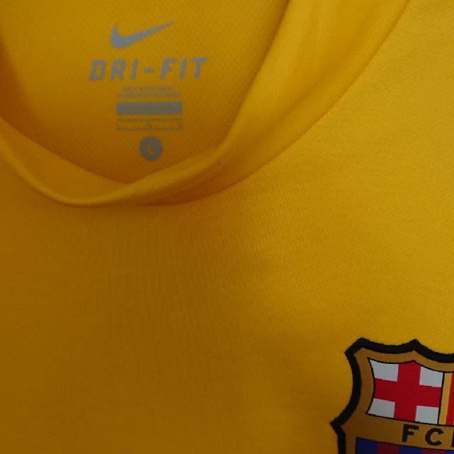 NIKE(ナイキ)のぺぺ様専用！ナイキ FCバルセロナ サッカー ユニフォーム 黄色 size Ｌ スポーツ/アウトドアのサッカー/フットサル(ウェア)の商品写真